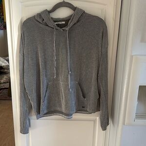 Women’s O’Neill hooded  pullover long sleeve size small navy and white striped